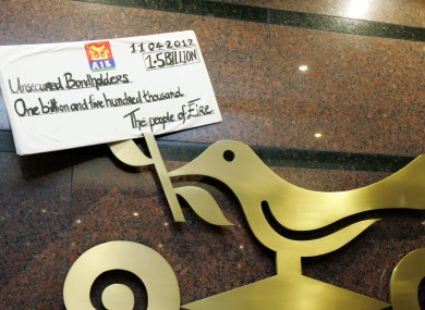 A placard left inside an AIB office in Dublin by protesters earlier today.