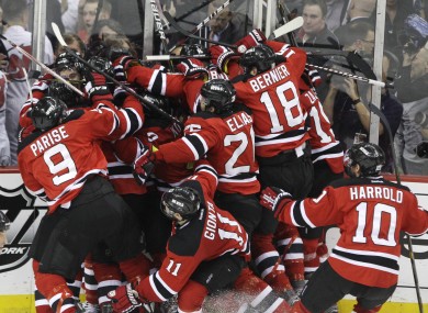 The Devils swarm all over the matchwinner after they bested New York.