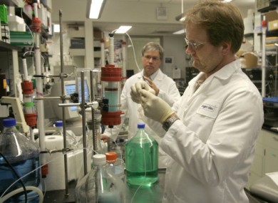 File photo of scientists working at Biogen Idec, which developed Tysabri.
