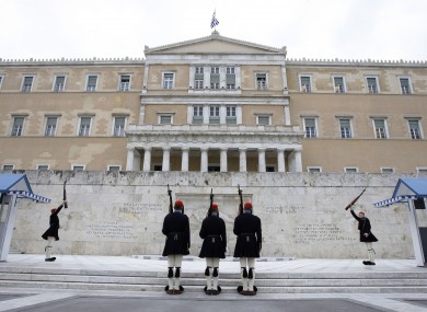 Soldiers perform the changing of the guard outside the Greek presidential palace.