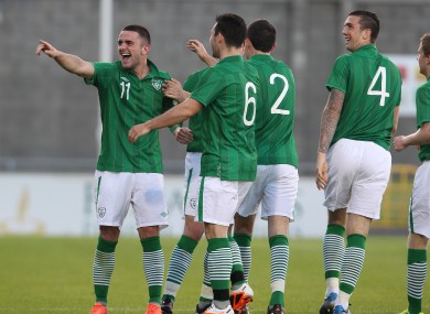 Robbie Brady (left) celebrates scoring during the Ireland U21s' 2-1 defeat to Denmark in Tallaght last night.