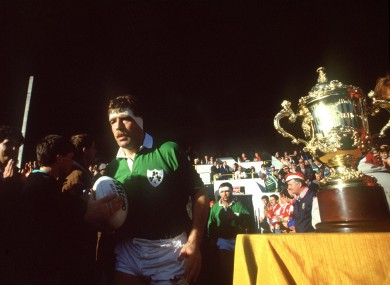 Donal Lenihan jogs out past the Webb Ellis trophy in 1987.