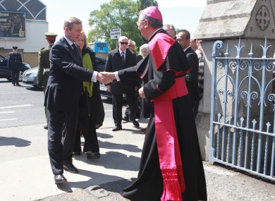 Taoiseach Enda Kenny shakes hands with Archbishop of Dublin Diarmuid Martin at the funeral of Garret Fitzgerald earlier this year
