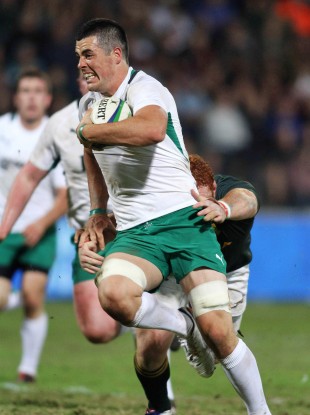 Ireland's Jordan Coghlan breaks Steven Kitshoff's tackle to run in for a try in Monday's game.