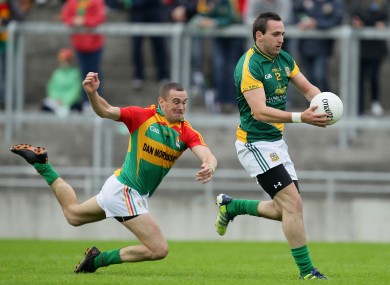 Meath's Graham Reilly escapes the grasp of Tony Bolger.