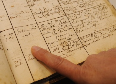 A person reads an entry in a parish register r in Besigheim, near Stuttgart, southern Germany