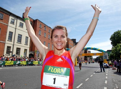 Linda Byrne celebrates winning the 2012 Flora Women's Mini Marathon.