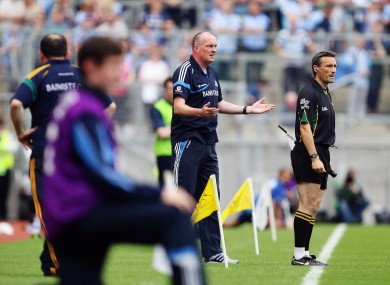 Dublin boss Pat Gilroy with linesman Maurice Deegan during last Sunday's match.