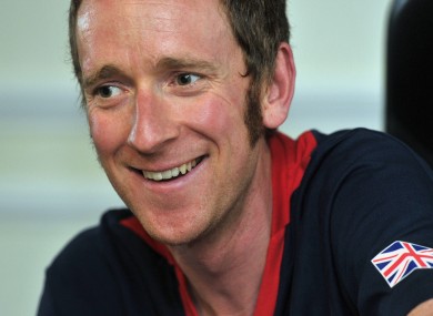 Bradley Wiggins faces the press in London.