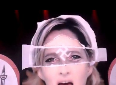 A doctored image of Marine Le Pen with a swastika superimposed over her face