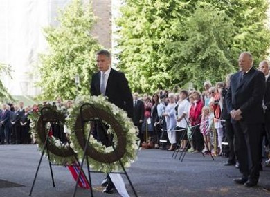 Norwegian King Harald, right, and Prime Minister Jens Stoltenberg, center, attend a memorial ceremony for the victims.