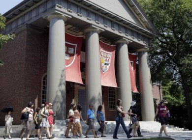 A tour group walking around Harvard campus today.