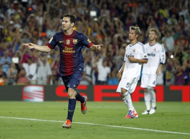 Lionel Messi celebrates after putting Barcelona 2-1 up from the penalty spot.