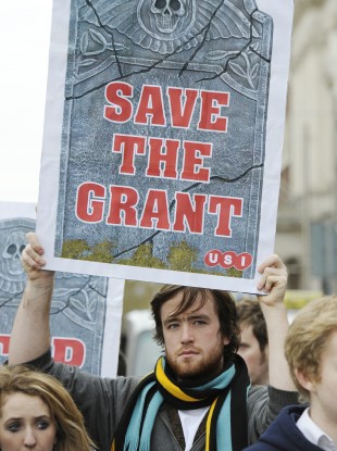 A student participates in a demonstration last year against cuts to college grants. South Tipperary County Council has abandoned plans to link grant payments to the €100 household charge.