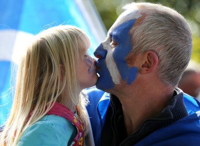 Scottish Independence supporters Alec and daughter Lena Forbes from Wick attend a rally for Scottish Independence in Princess Street Gardens, Edinburgh.