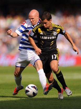 Queens Park Rangers' Andrew Johnson (right) and Chelsea's Eden Hazard.