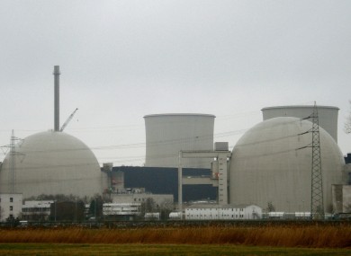 A file photo of the Biblis nuclear power plant in Hesse, Germany. The government is increasing a surcharge on electricity bills to fund development of sustainable sources.