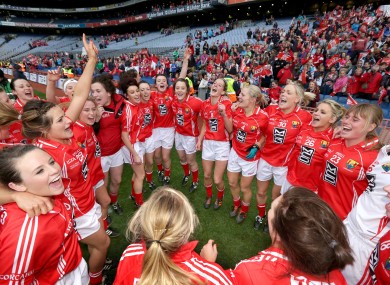 Cork players celebrate winning the All-Ireland ladies senior final.