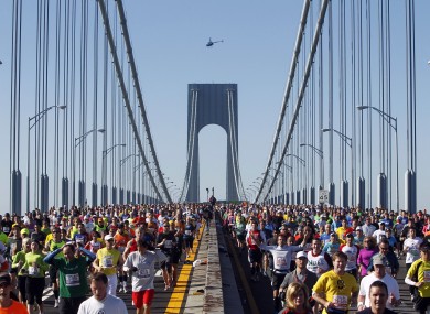 Runners cross the Verrazano-Narrows Bridge at the start of the New York City Marathon last year.