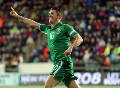 Robbie Keane tries to claim the goal that was later awarded to strike partner Jon Walters.