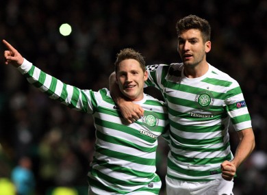 Kris Commons and Charlie Mulgrew celebrate the winning goal.