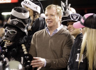 NFL commissioner Roger Goodell watches a game with Oakland Raiders fans last week.