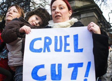 Pictured at a protest against cuts to the Respite Care Grant yesterday, Louise Poole with her son Tiarnan.