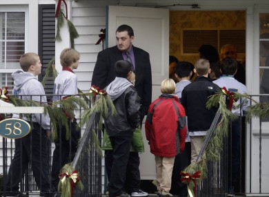 Mourners arrive for the funeral of school shooting victim, Jack Pinto aged 6.