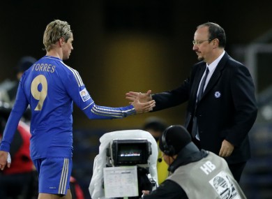 Torres is congratulated by manager Benitez during the semi-final.