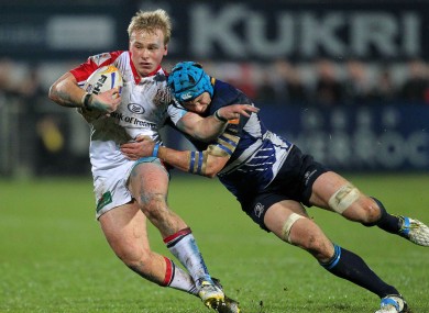Luke Marshall tries to brush off Kevin McLaughlin in his side's 27-19 win.