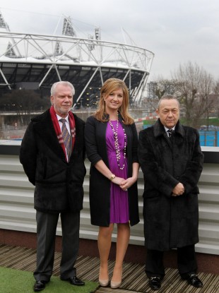 West Ham football club owners David Gold (left) and David Sullivan (right) with vice-chairman Karren Brady posing in front of the Olympic Stadium in London.