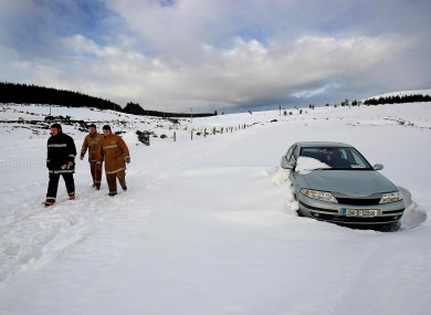 Dublin Civil Defence members in snow drifts in Wicklow on 13 January 2010.