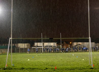 Dublin players warm down after the game was called off.