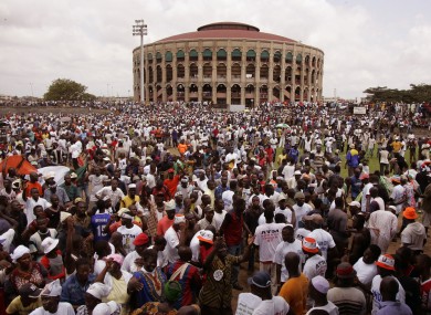 File photo of a political rally at a stadium in Abidjan in 2005. 60 children are reported to have died after a stampede at a stadium in the city.