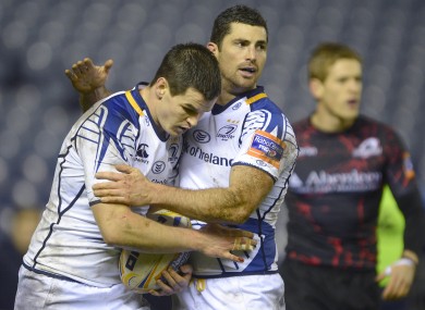 Jonathan Sexton is congratulated by Rob Kearney after his try.