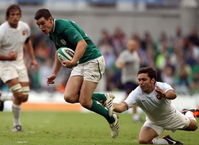 Jonathan Sexton is tackled by France's Dimitri Yachvilli.