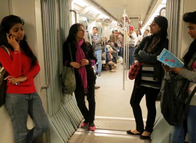Indian women travel inside a Women Only metro train compartment in New Delhi, India, Saturday, Feb. 2, 2013.