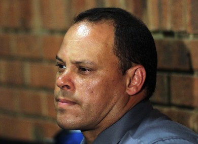 Investigating officer Hilton Botha, sits inside the court witness box during the Oscar Pistorius bail hearing.