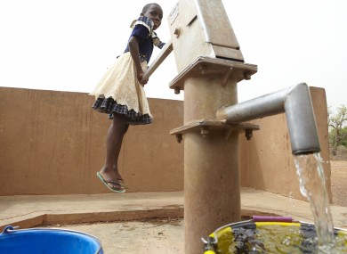 Jessica Batoure fetches water for her class in Soanga school, north central Burkina Faso.