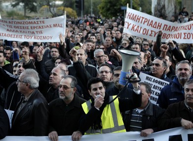 Bank employees protest outside the Ministry of Finance yesterday, demanding clarity on the future of their jobs and opposing a deposit levy.