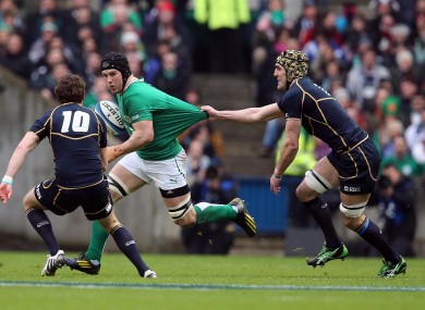 Kelly Brown (r) attempts to slow down O'Brien.