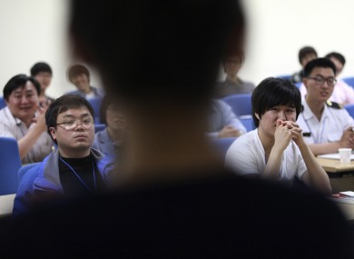 South Korean cyber activists listen to a lecture from a North Korean defector in Suwon, South Korea