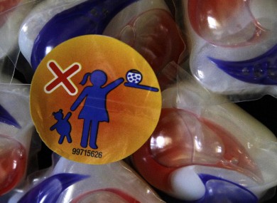 A warning label is attached to a package of Tide laundry detergent packets in Houston, Texas.