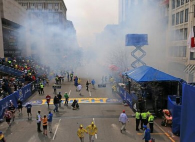 Boston Globe photographer David L Ryan captured the immediate aftermath of the blasts at Boylston Street in central Boston.