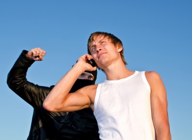 Most mobile phones are stolen from their owner's hand while being used on the street.