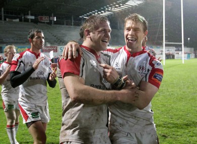 Ulster's Chris Henry and Andrew Trimble celebrate after beating Cardiff.