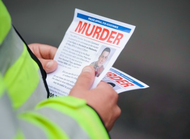 Police hand out leaflets seeking witnesses to the murder of Lee Rigby in Woolwich last week.