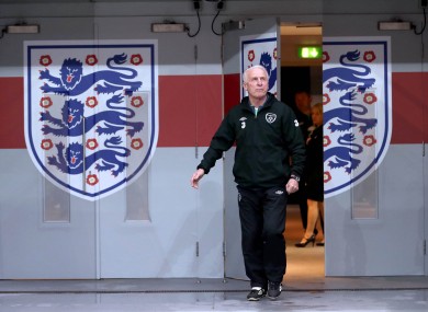 Manager Giovanni Trapattoni makes his way out for training.