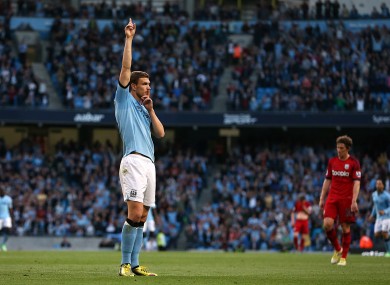 Dzeko celebrates the game's only goal.