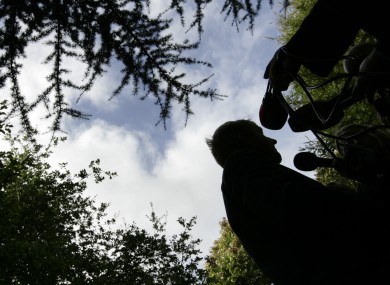 A silhouette of Enda Kenny is seen at the launch of a National Trails Day in 2011.
